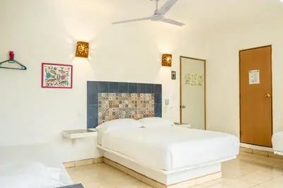 Cama o camas de una habitación en Casa Mazunte Tierra Viva