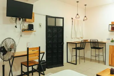 Una televisión o centro de entretenimiento en Casa Don José: GRANADAS