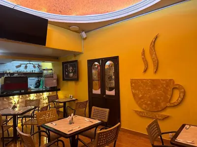 Un restaurante o sitio para comer en Hotel Colonial