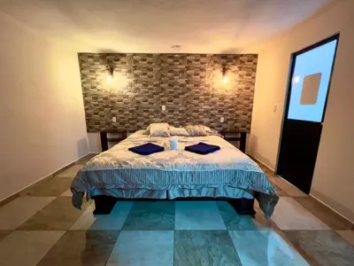 Cama o camas de una habitación en Cabañas el gigante