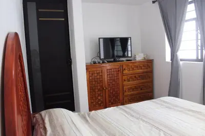 Cama o camas de una habitación en Casa Tenorio Hospedaje