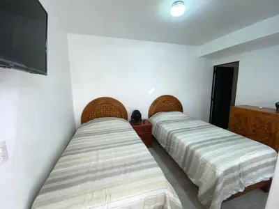 Cama o camas de una habitación en Casa Tenorio Hospedaje
