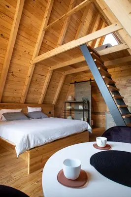 Cama o camas de una habitación en Cabañas Chalets Piedra Alta Zacatlan