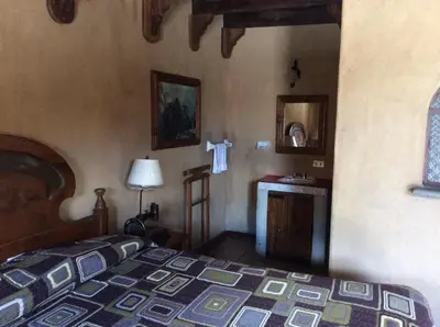 Cama o camas de una habitación en Hosteria Covadonga