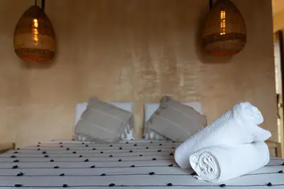 Cama o camas de una habitación en Casa Mariposa Beach Hotel