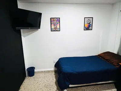 Cama o camas de una habitación en B Habitaciones CRT
