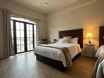 Cama o camas de una habitación en Hotel Santa María