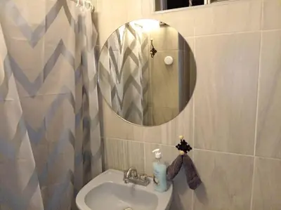 Un baño de Departamento Cerca del Aeropuerto/ Buena Ubicación