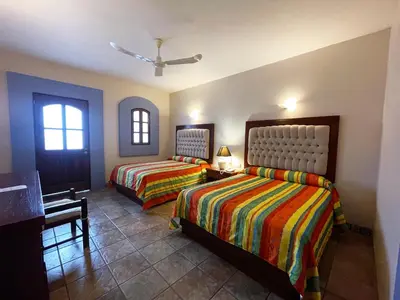 Cama o camas de una habitación en Santa Helena Plaza