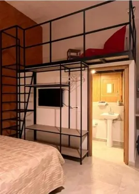 Cama o camas de una habitación en Las Heliconias