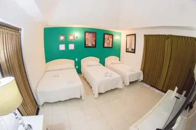 Cama o camas de una habitación en HOTEL OBREGON