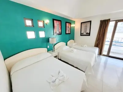 Cama o camas de una habitación en HOTEL OBREGON