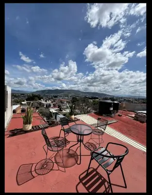 Un balcón o terraza de Cozy Refuge 3 Bd house steps from Santo Domingo
