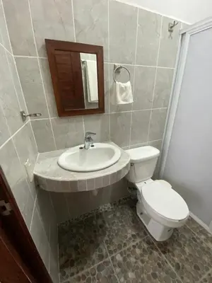 Un baño de Casa Suites Minizoo