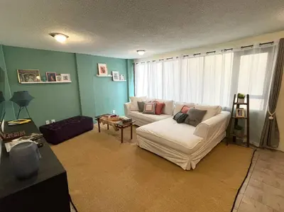Cama o camas de una habitación en Departamento con estacionamiento Del Valle
