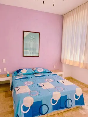 Cama o camas de una habitación en Tiki’s Penth