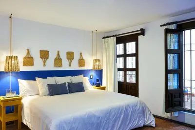 Cama o camas de una habitación en AmazINN Stay CDMX Coyoacan