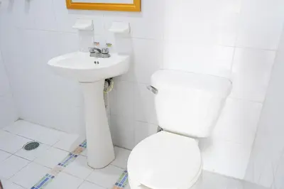 Un baño de OYO Hotel El Conquistador