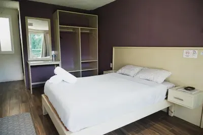 Cama o camas de una habitación en JH Hotel Tlatlauqui