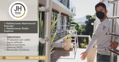Certificado, premio, señal o documento que está expuesto en JH Hotel Tlatlauqui