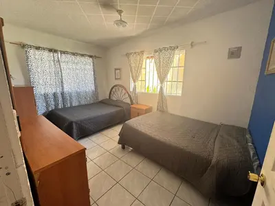 Cama o camas de una habitación en Casa de descanso alberca climatizada