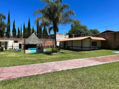 Jardín al aire libre en Casa de descanso alberca climatizada