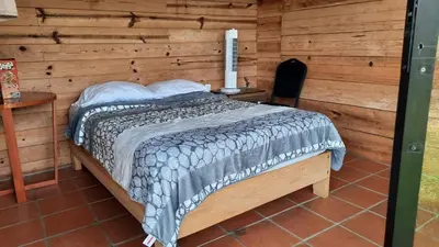 Cama o camas de una habitación en Cabañas Tepani