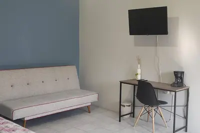 Una televisión o centro de entretenimiento en Casa Inés/ Terraza/ Centro de Oaxaca