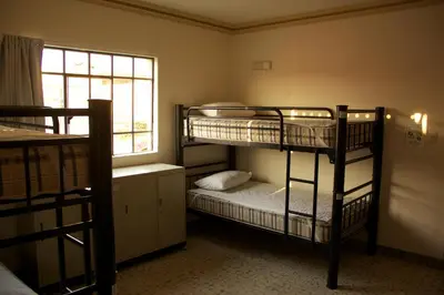 Cama o camas de una habitación en Paulina Youth Hostel