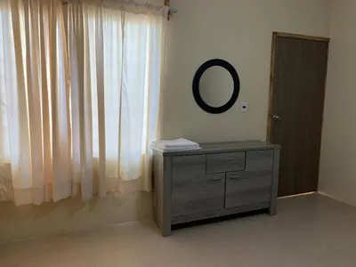 Cama o camas de una habitación en Departamento completo, cómodo y cerca del aeropuerto