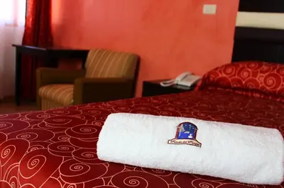 Cama o camas de una habitación en Hotel Posada Del Parque