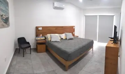 Cama o camas de una habitación en Residencial San Agustin Huatulco