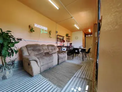 Zona de estar de Casa contenedor Finca la laguna