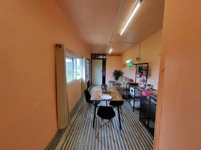 Zona de estar de Casa contenedor Finca la laguna