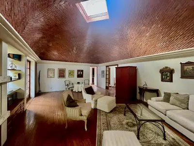 Una televisión o centro de entretenimiento en Casa La Bonita