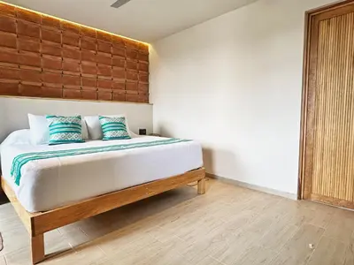 Cama o camas de una habitación en Aymara Punta Zicatela