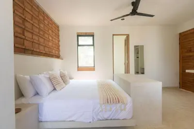 Cama o camas de una habitación en Aymara Punta Zicatela