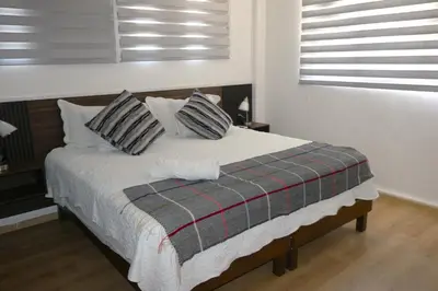 Cama o camas de una habitación en Pino Apartment