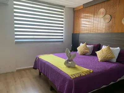 Cama o camas de una habitación en Pino Apartment