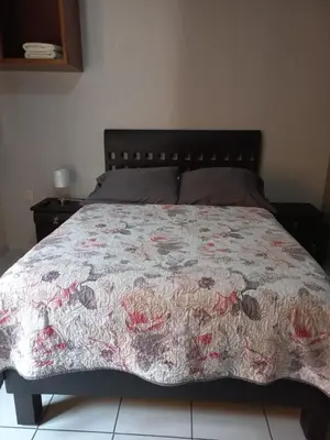 Cama o camas de una habitación en Agradable y cómodo departamento a 5 minutos del aeropuerto