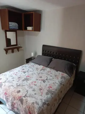 Cama o camas de una habitación en Agradable y cómodo departamento a 5 minutos del aeropuerto