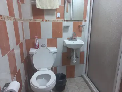 Un baño de Agradable y cómodo departamento a 5 minutos del aeropuerto