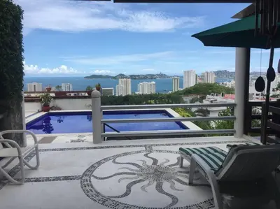 Un balcón o terraza de Hermosa Villa Puesta al SOL