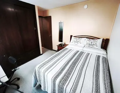 Cama o camas de una habitación en Cozy bedroom at 5 min Mexico City Airport T1 & T2