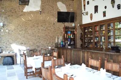 El salón o zona de bar de Rústika SPA Hotel Boutique