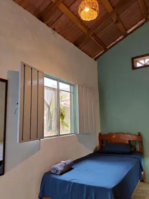 Cama o camas de una habitación en Cabañas La Escondida Mazunte