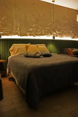 Cama o camas de una habitación en Layoo, Tu casa en Oaxaca 102