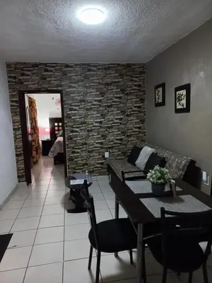 Zona de estar de Cómodo & confortable apartamento. 5 minutos del aeropuerto