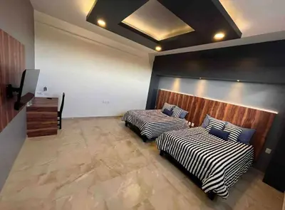 Cama o camas de una habitación en La FUNDICION