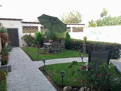 Jardín al aire libre en Apartment Tortugas - rooms with AC and great pool at 5 min from Carrizalillo beach and Benito Juarez Bulevard